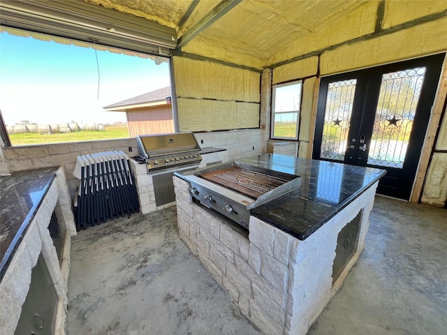 view of patio / terrace with grilling area and an outdoor kitchen