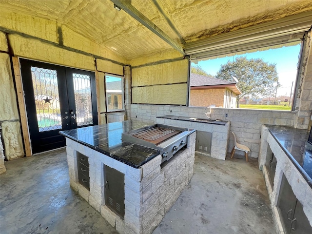 view of patio with sink and exterior kitchen