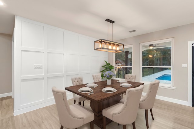 dining space featuring light hardwood / wood-style flooring