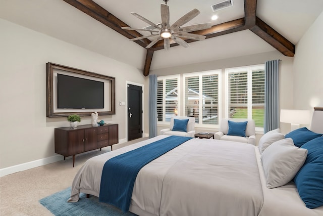 carpeted bedroom with lofted ceiling with beams and ceiling fan