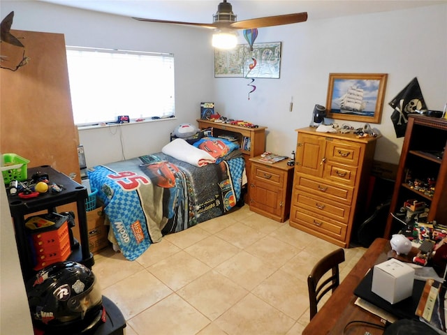 bedroom featuring ceiling fan and light tile patterned floors