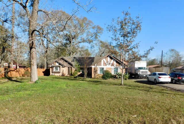 view of front of property with a front lawn