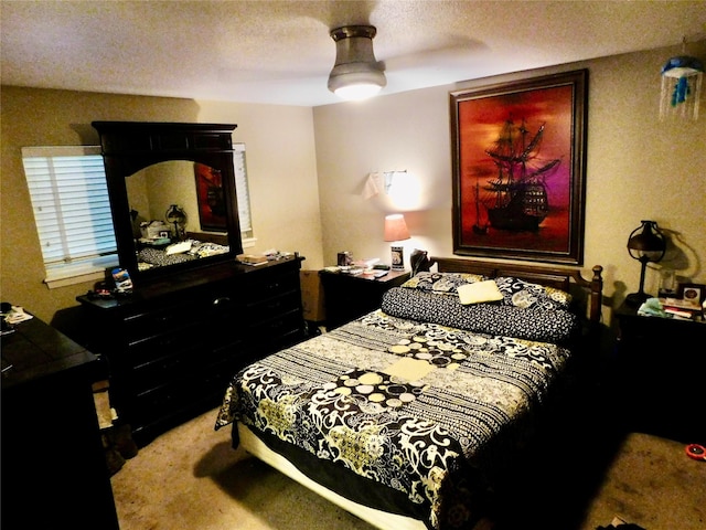 carpeted bedroom with a textured ceiling