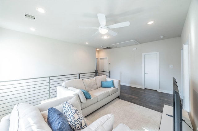 living room with ceiling fan and hardwood / wood-style flooring