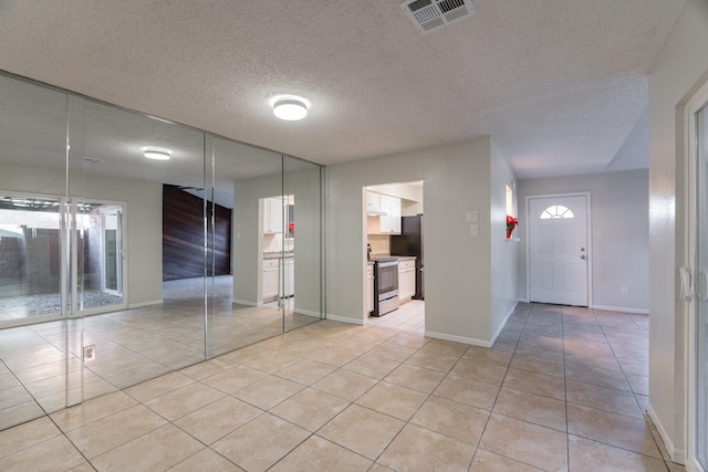 interior space featuring light tile patterned floors