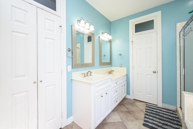 bathroom with vanity and tile patterned floors