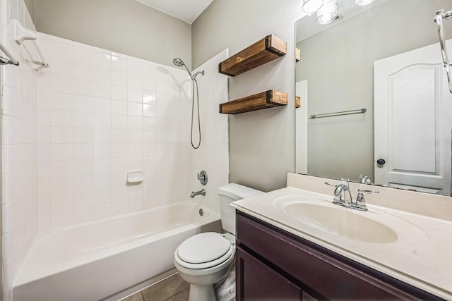 full bathroom featuring tile patterned floors, vanity, toilet, and washtub / shower combination