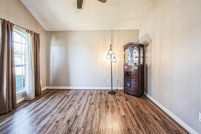 unfurnished room with wood-type flooring, vaulted ceiling, and ceiling fan