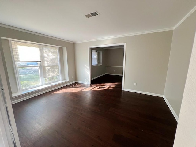 unfurnished room with dark hardwood / wood-style floors and ornamental molding