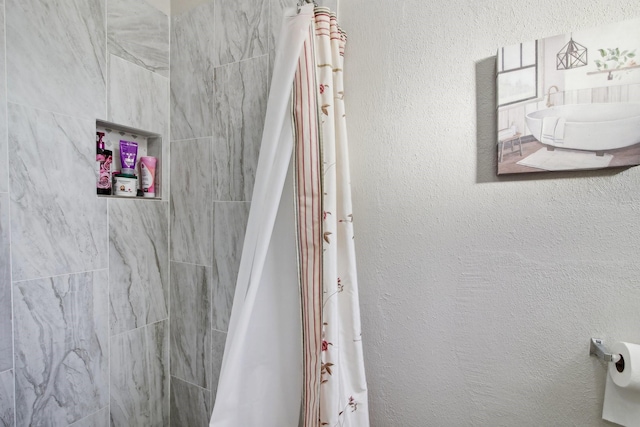 bathroom with walk in shower