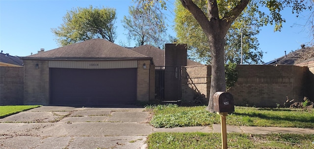 view of front of home with a garage