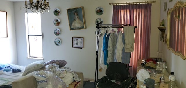 bedroom featuring a chandelier