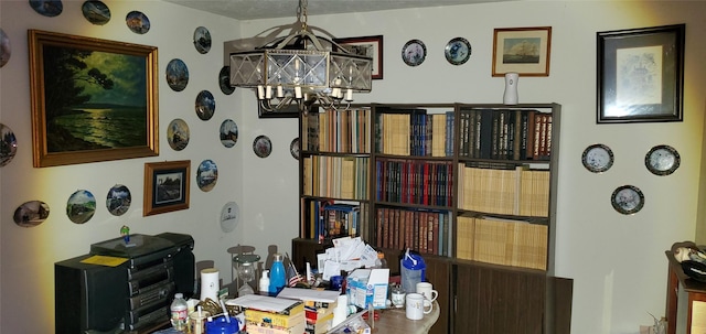 dining space featuring an inviting chandelier