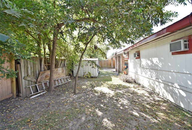 view of yard with a storage shed