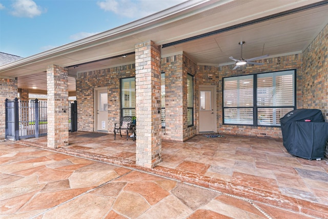 view of patio / terrace featuring ceiling fan and grilling area