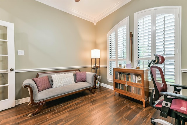 living area featuring ornamental molding