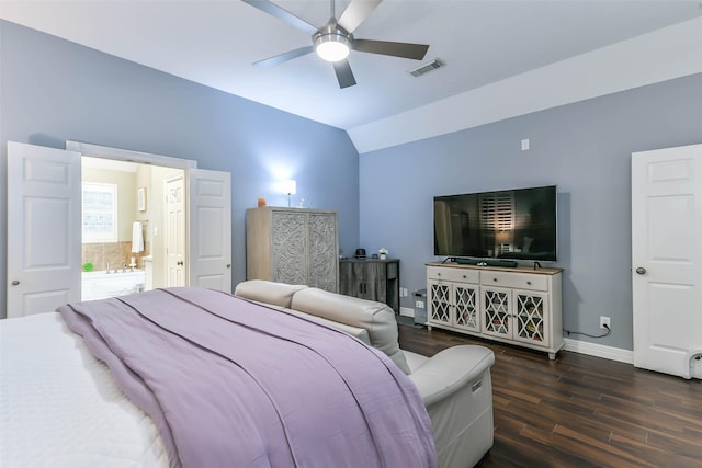 bedroom featuring ceiling fan, dark hardwood / wood-style flooring, and vaulted ceiling