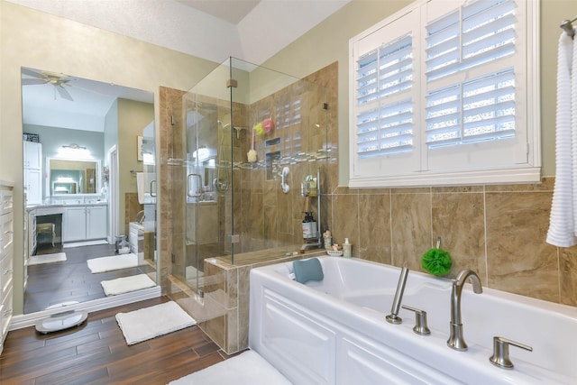 bathroom with vanity, separate shower and tub, and ceiling fan