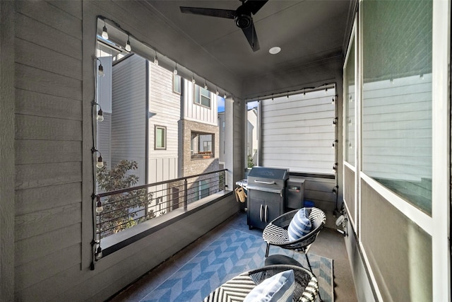 balcony with a grill and ceiling fan