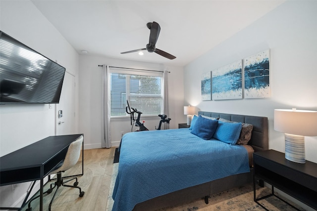 bedroom featuring light hardwood / wood-style flooring and ceiling fan