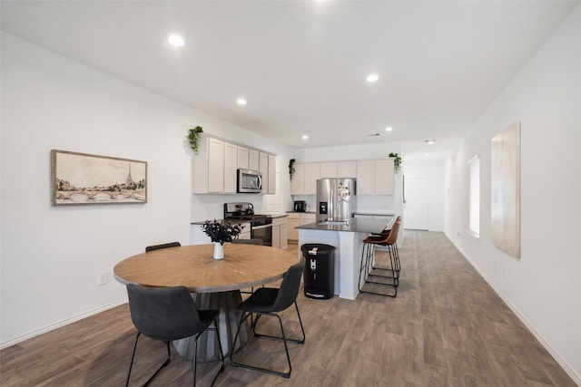 dining area featuring light hardwood / wood-style floors