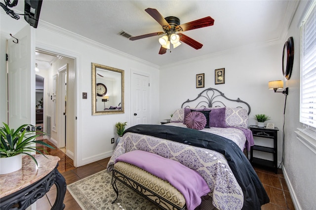 bedroom with dark wood-type flooring, ceiling fan, and ornamental molding