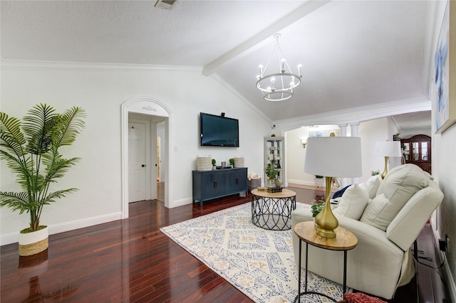 living room featuring vaulted ceiling with beams, crown molding, and an inviting chandelier