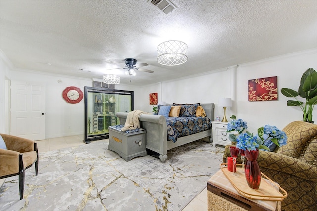 bedroom with ceiling fan, light tile patterned floors, a textured ceiling, and ornamental molding