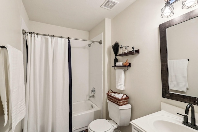 full bathroom featuring vanity, shower / tub combo, and toilet