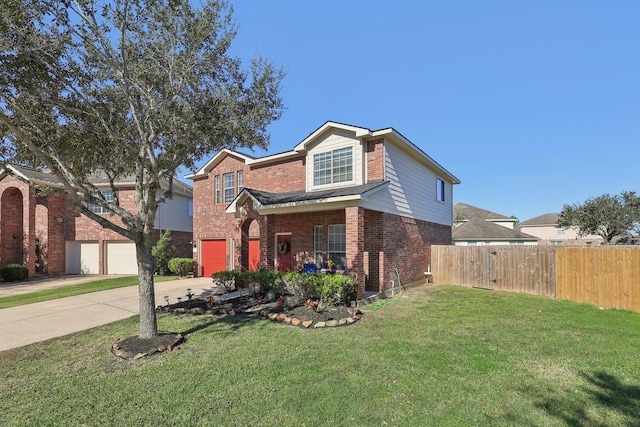 view of front facade with a garage and a front yard