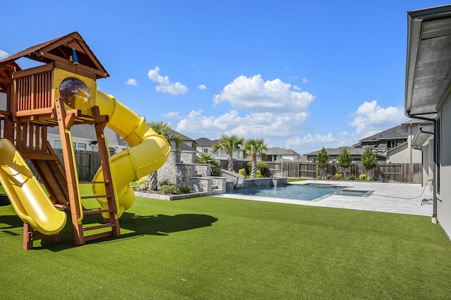 view of pool featuring a playground, a patio area, and a lawn