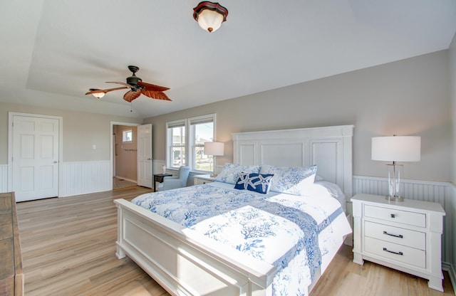 bedroom featuring ceiling fan and light wood-type flooring