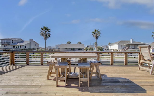 wooden deck with a residential view