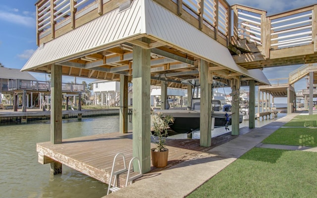 view of dock with a water view and boat lift