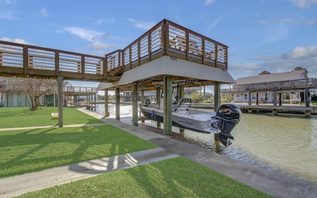 view of dock featuring boat lift, a water view, and a lawn