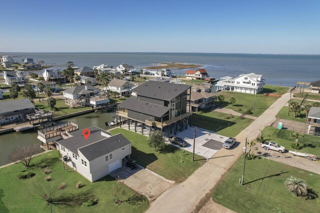 drone / aerial view with a water view