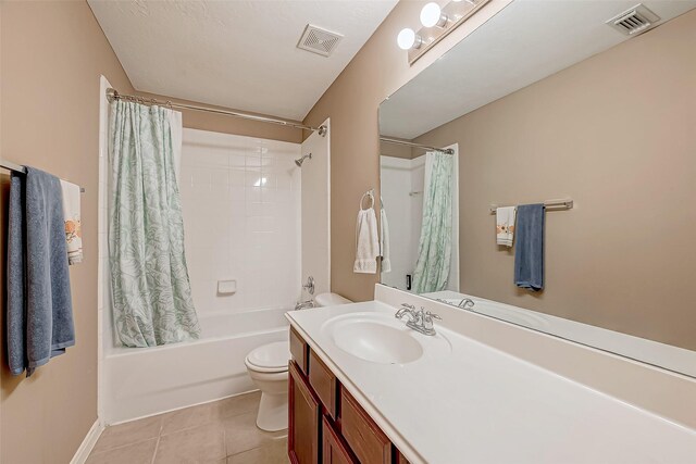 full bathroom featuring toilet, shower / bathtub combination with curtain, tile patterned floors, and vanity