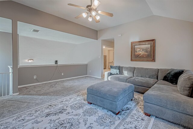 carpeted living room featuring lofted ceiling and ceiling fan