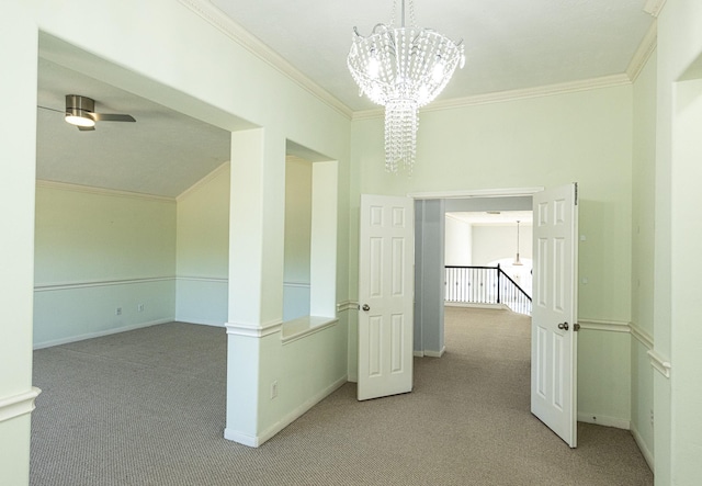 hall featuring light carpet, a chandelier, and ornamental molding