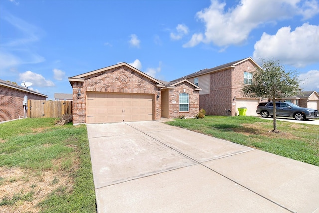 view of front of property featuring a front lawn and a garage