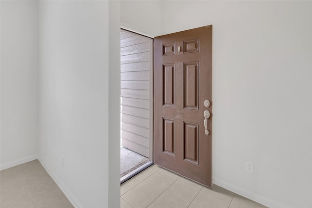 view of tiled foyer entrance