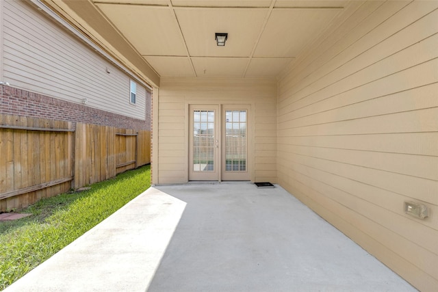 doorway to property with a patio