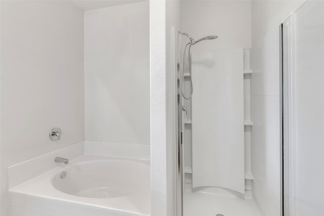 bathroom with independent shower and bath