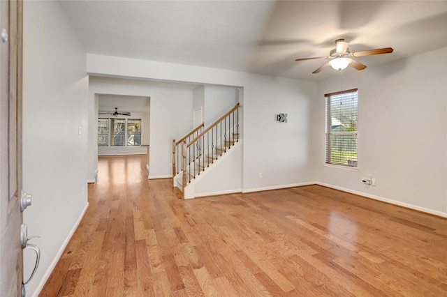 empty room featuring a wealth of natural light and light wood-type flooring