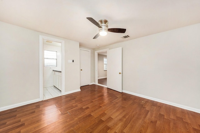 unfurnished room with ceiling fan and light hardwood / wood-style flooring