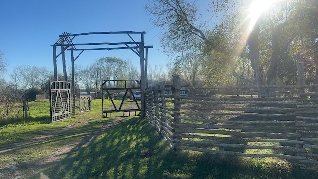 exterior space with a gate and fence