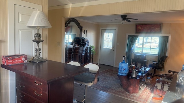 office with hardwood / wood-style floors, ceiling fan, and crown molding