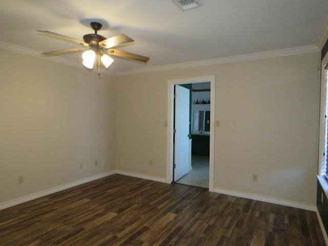 spare room with ceiling fan, dark hardwood / wood-style flooring, and ornamental molding