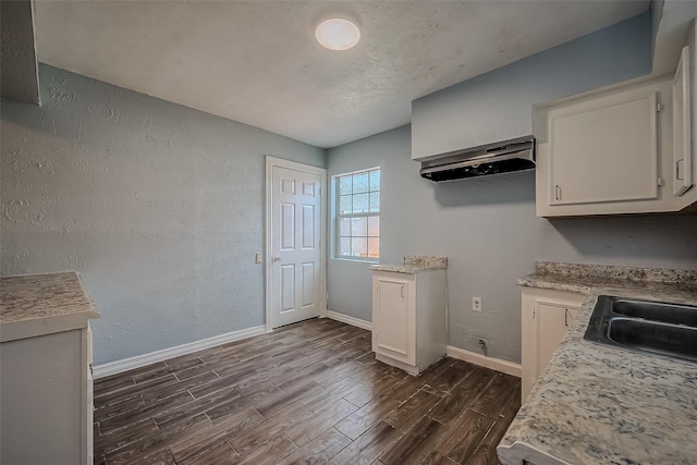 kitchen with sink and white cabinets