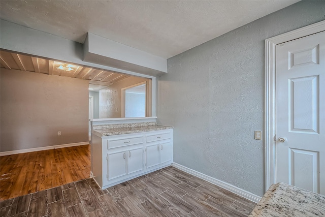 kitchen featuring white cabinets